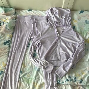 A super cute purple sweatsuit it had pockets and a zipper in the front